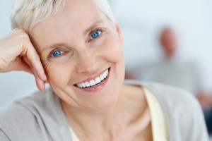 Photo of Senior Woman Smiling with Dentures